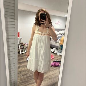 White Sleeveless Dress with Embroidered Details